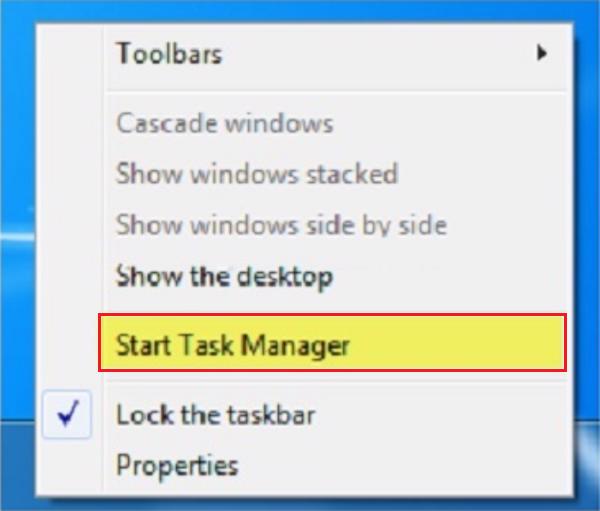 Click chuột phải vào thanh Taskbar sau đó chọn vào Start Task Manager