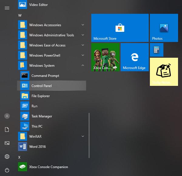 tìm đến file Windows System, sau đó nhấn vào và chọn ứng dụng Control Panel từ menu xổ xuốn
